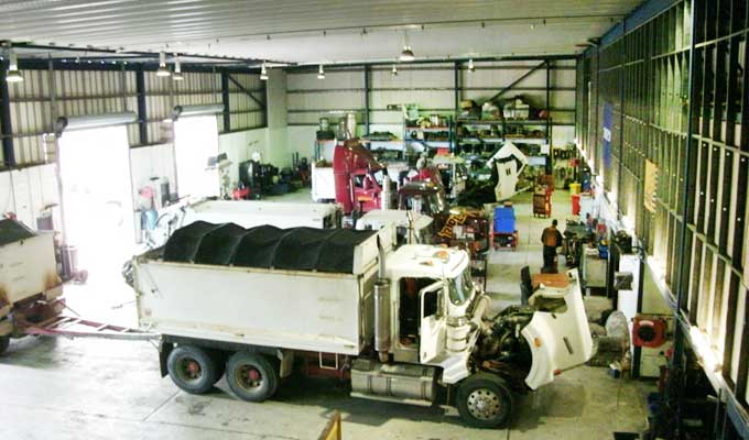 Secure lock-up yard with parked trucks